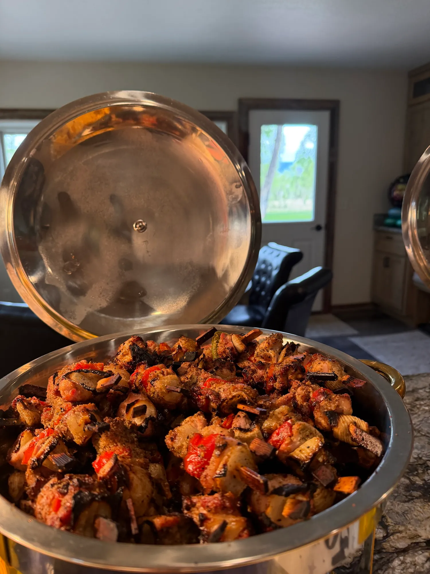 A round tray of crisp fried appetizers.